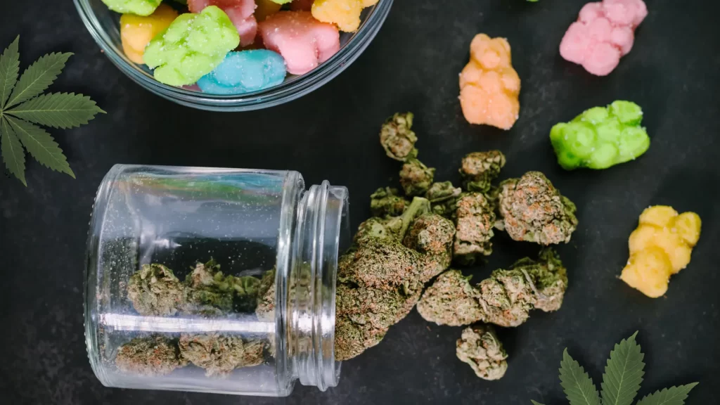 marijuana flower bud in a jar and flower edibles